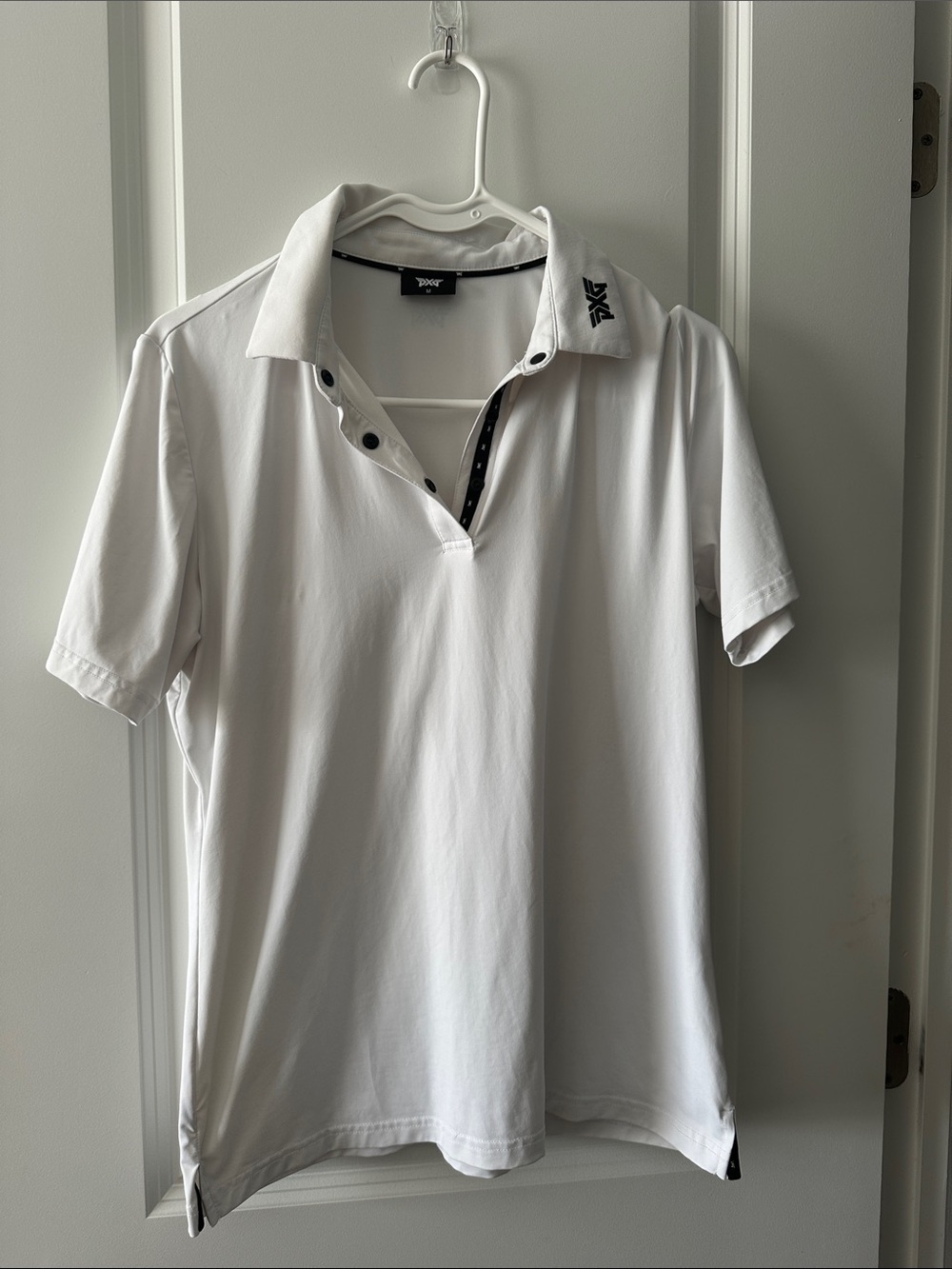 PXG Women’s White Performance Polo Shirt